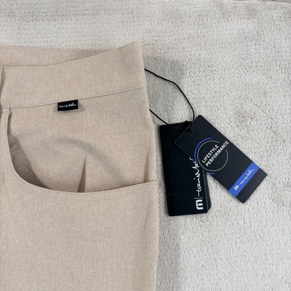 Travis Mathew Open to Close Golf Performance Pants in Khaki Men 34x32 Tag 33 NWT